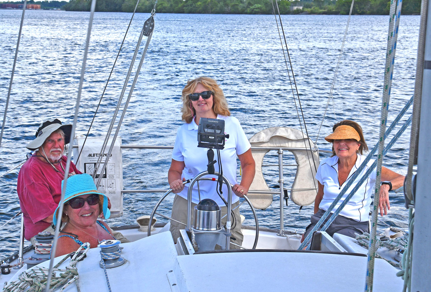 crew at wheel in cockpit